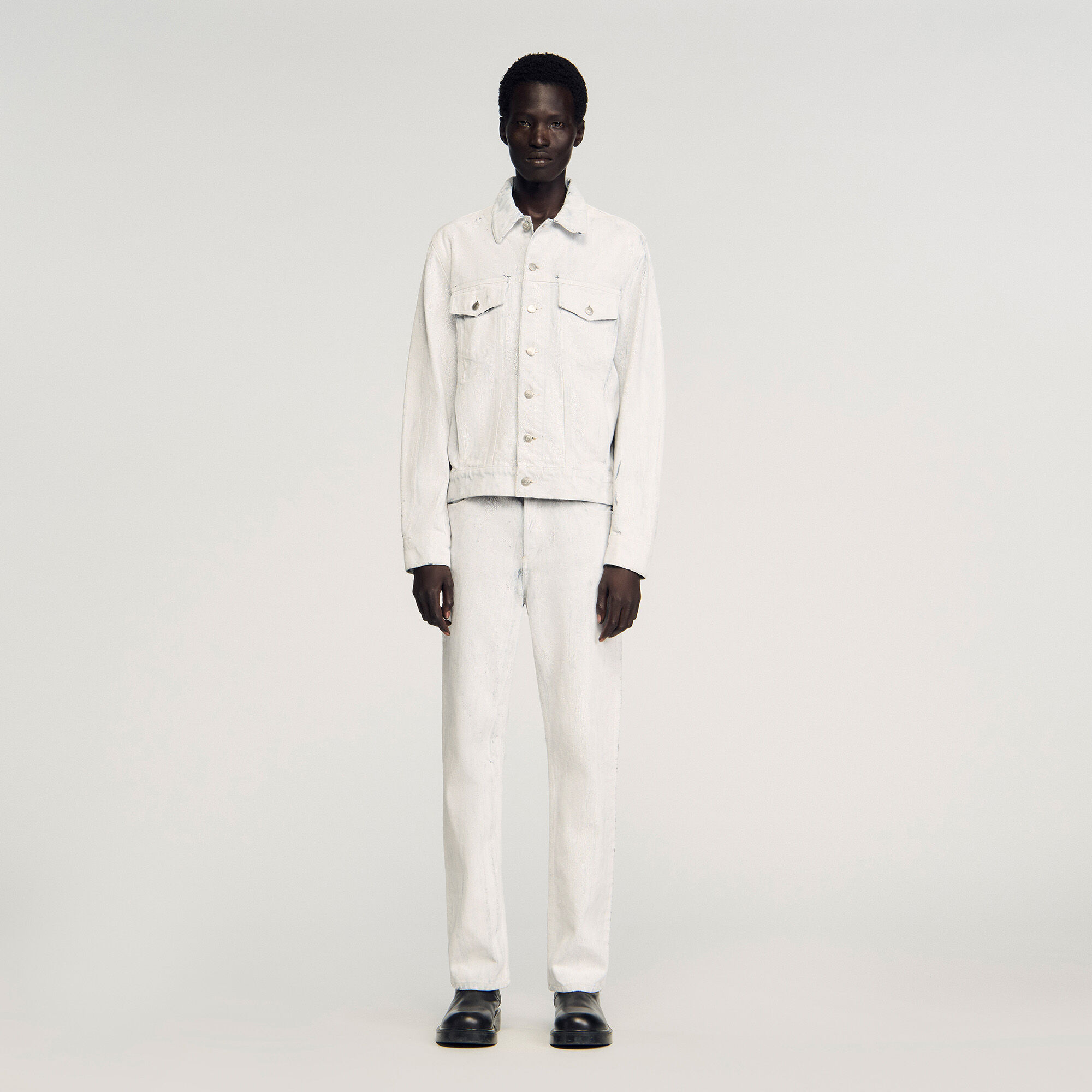 Veste en denim enduite fissurée