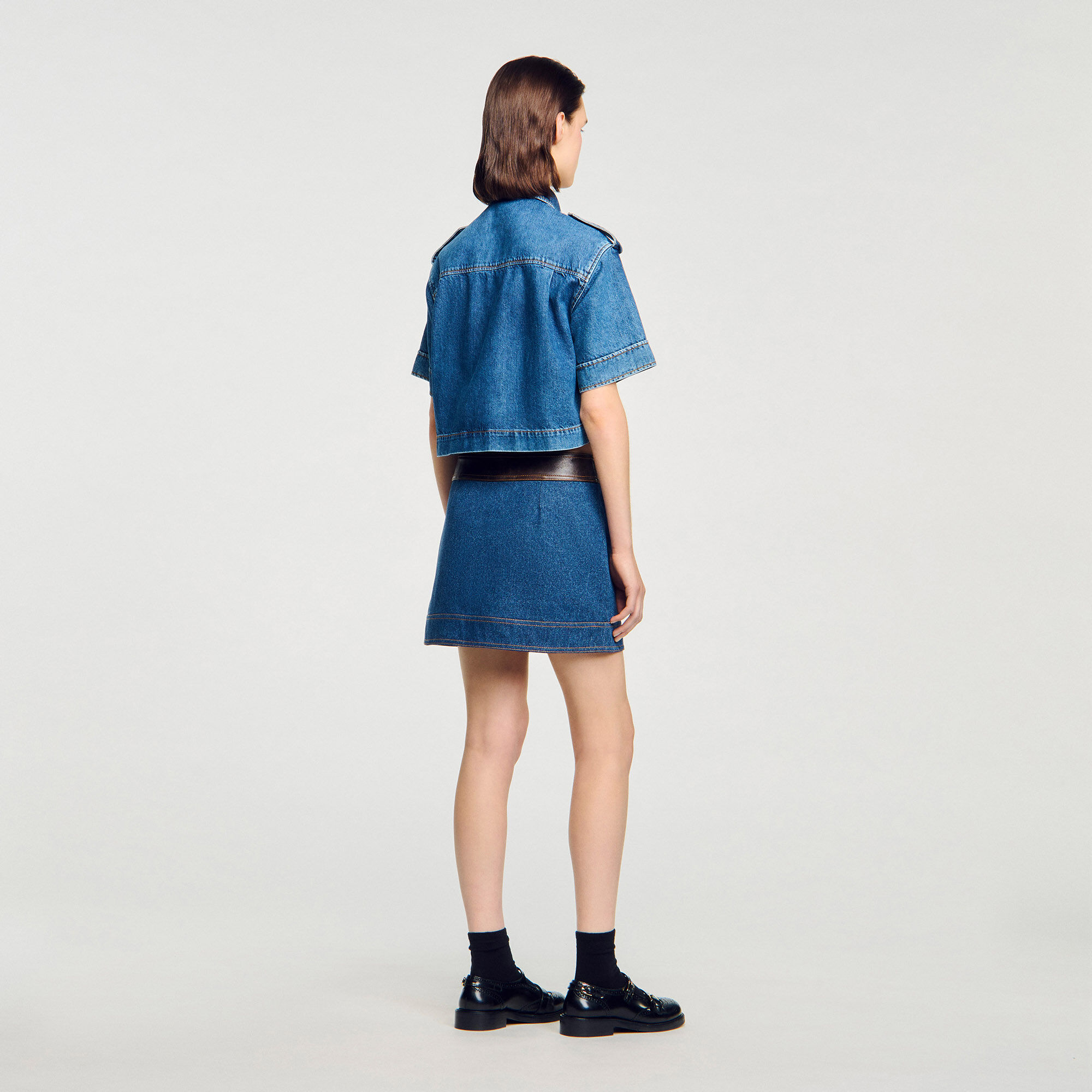 Mini jupe en denim et cuir