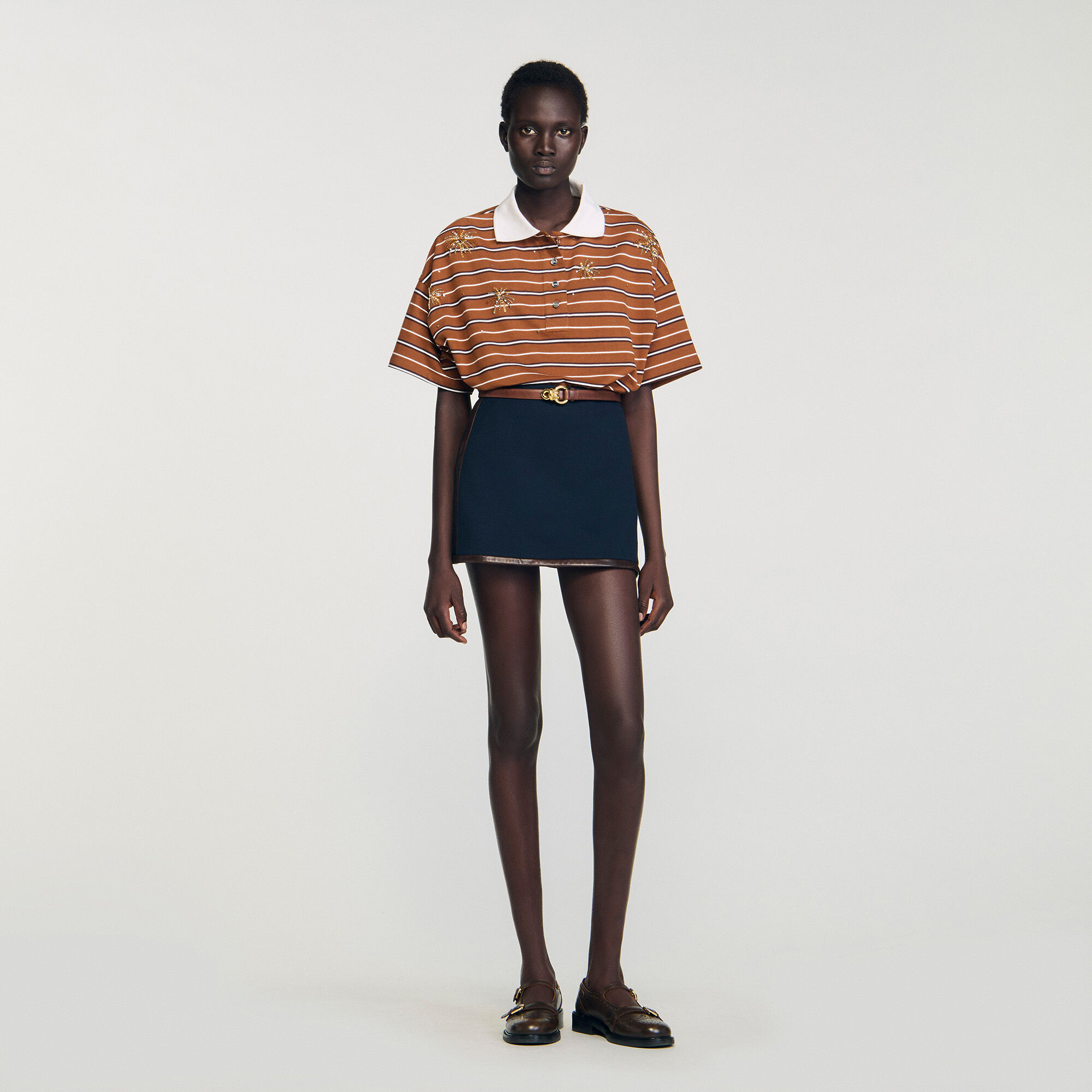 Mini jupe avec des bandes en cuir