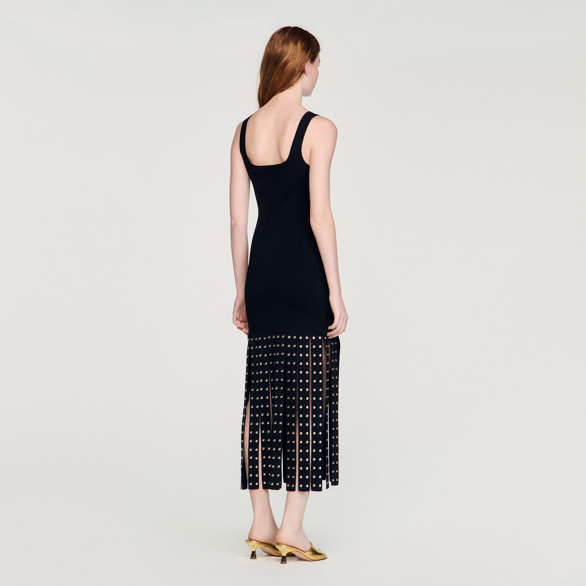 Robe mi-longue en tricot frangée