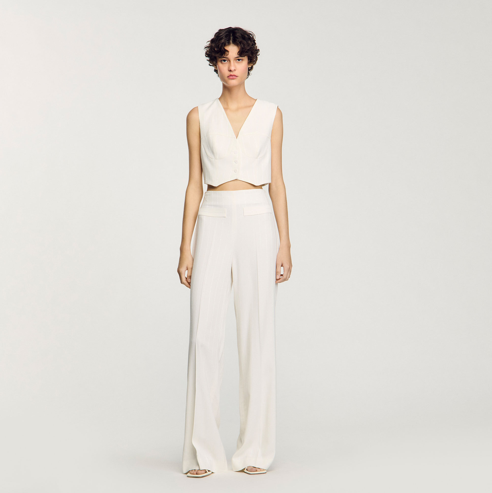 Gilet court à paillettes