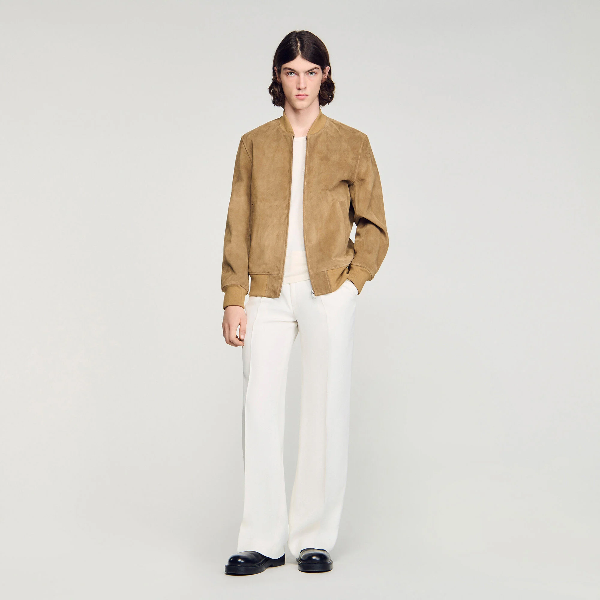 Veste en daim à fermeture éclair et fente