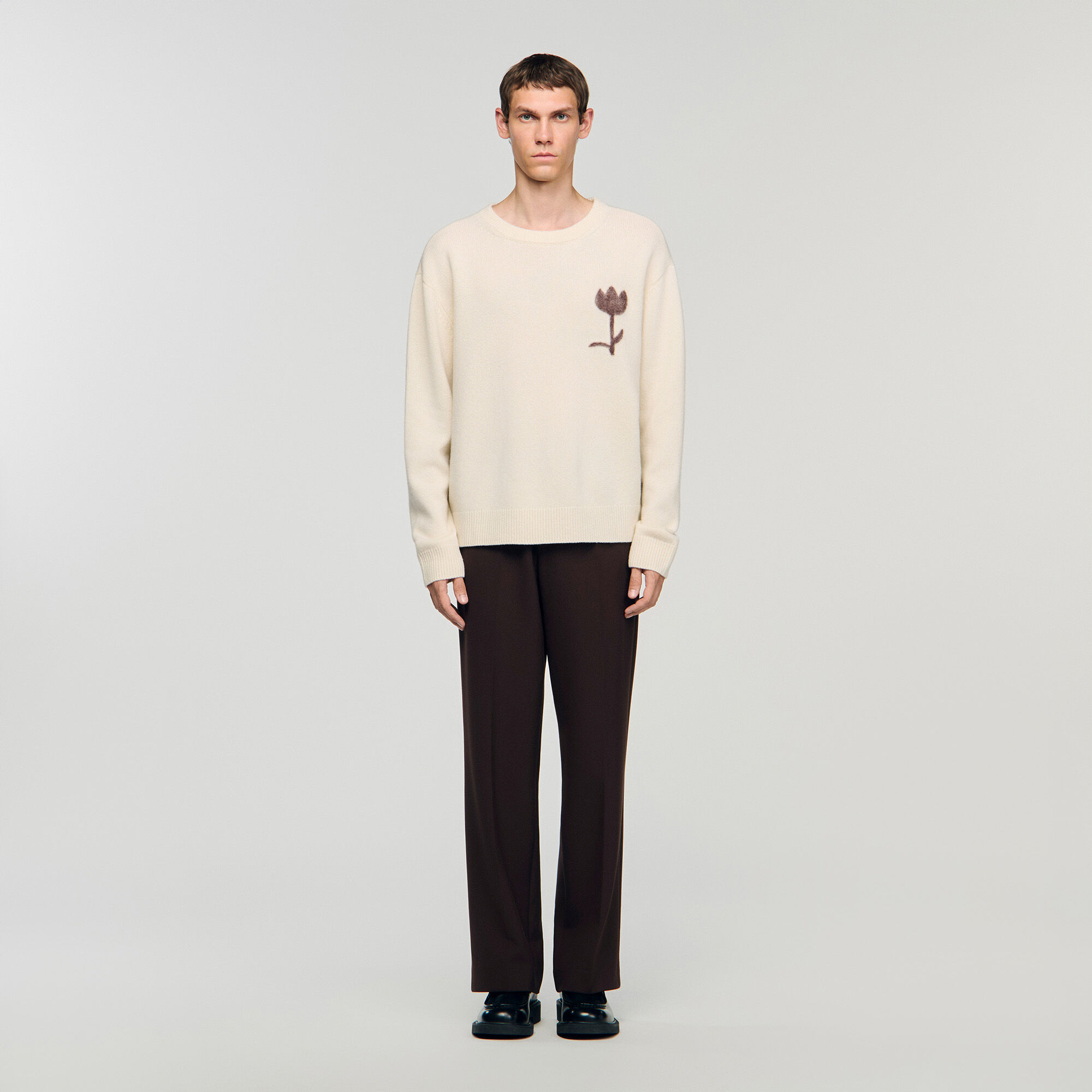 Pull en laine avec détails floraux