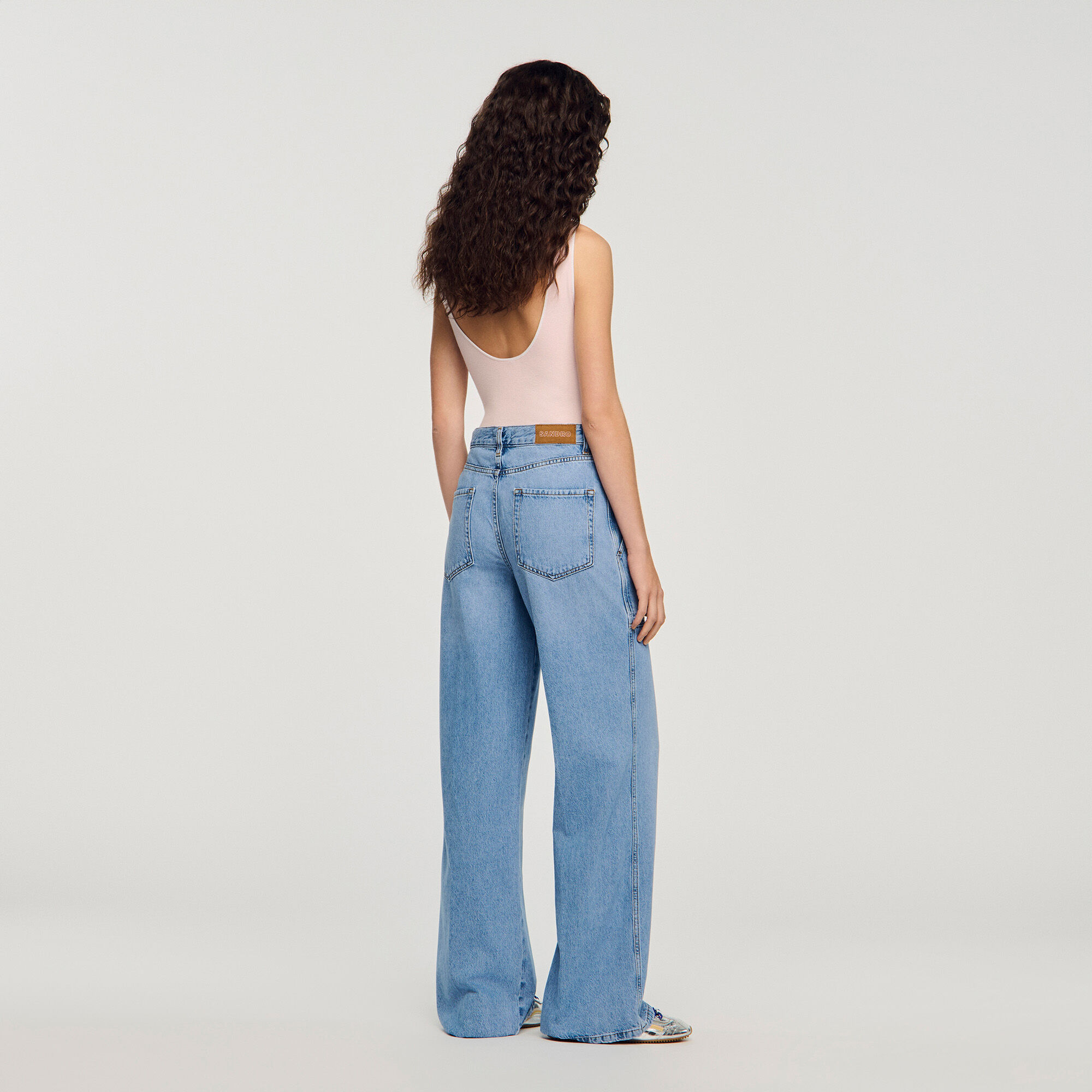 Jean slim à jambes larges délavées