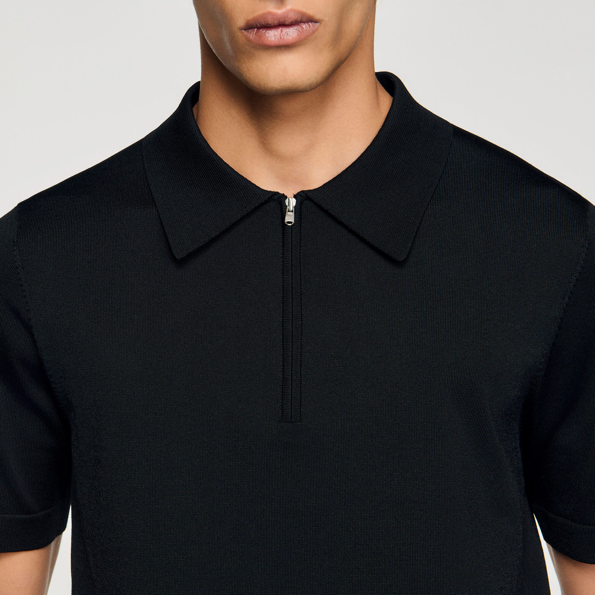 Polo tricot à col à glissière