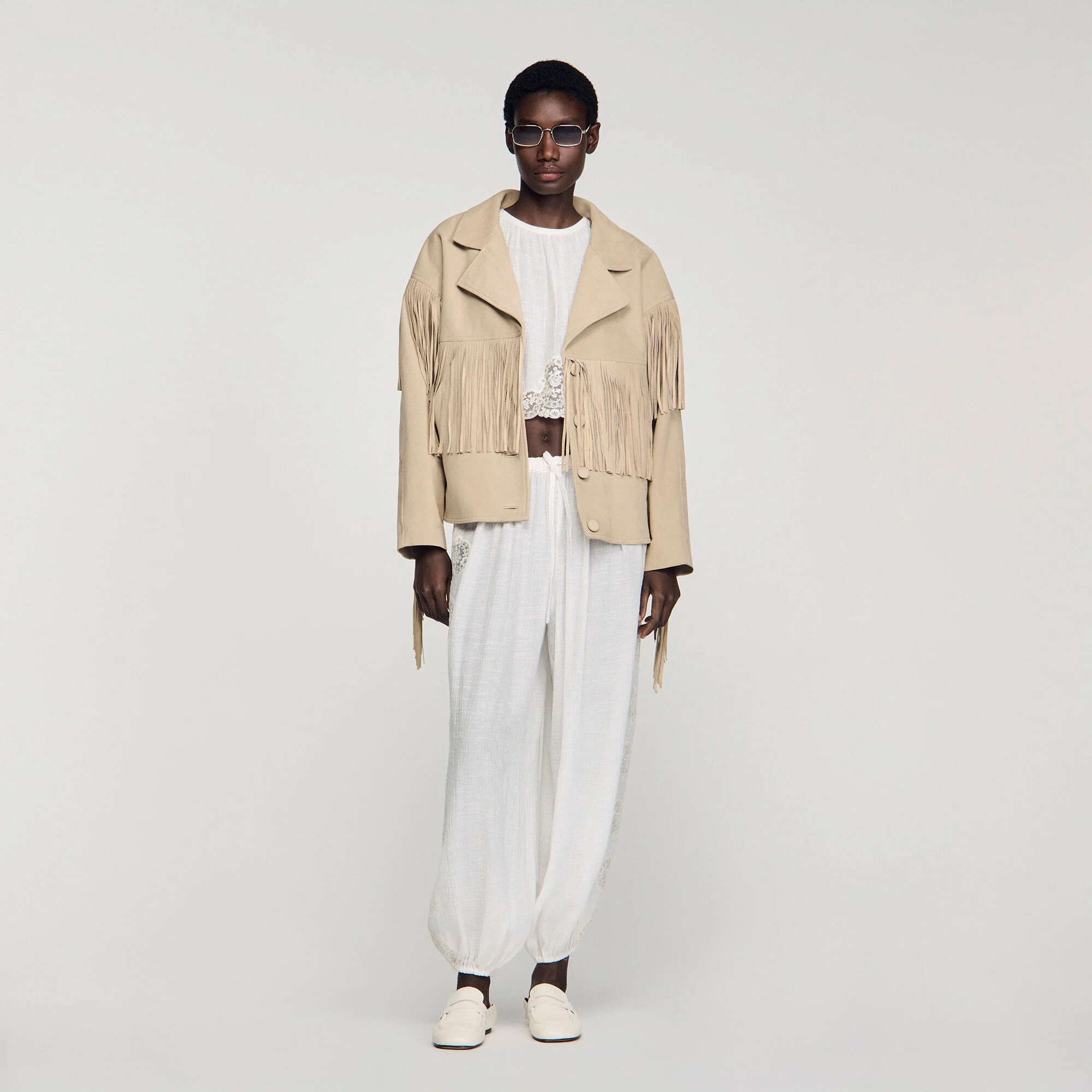 Veste en daim frangée
