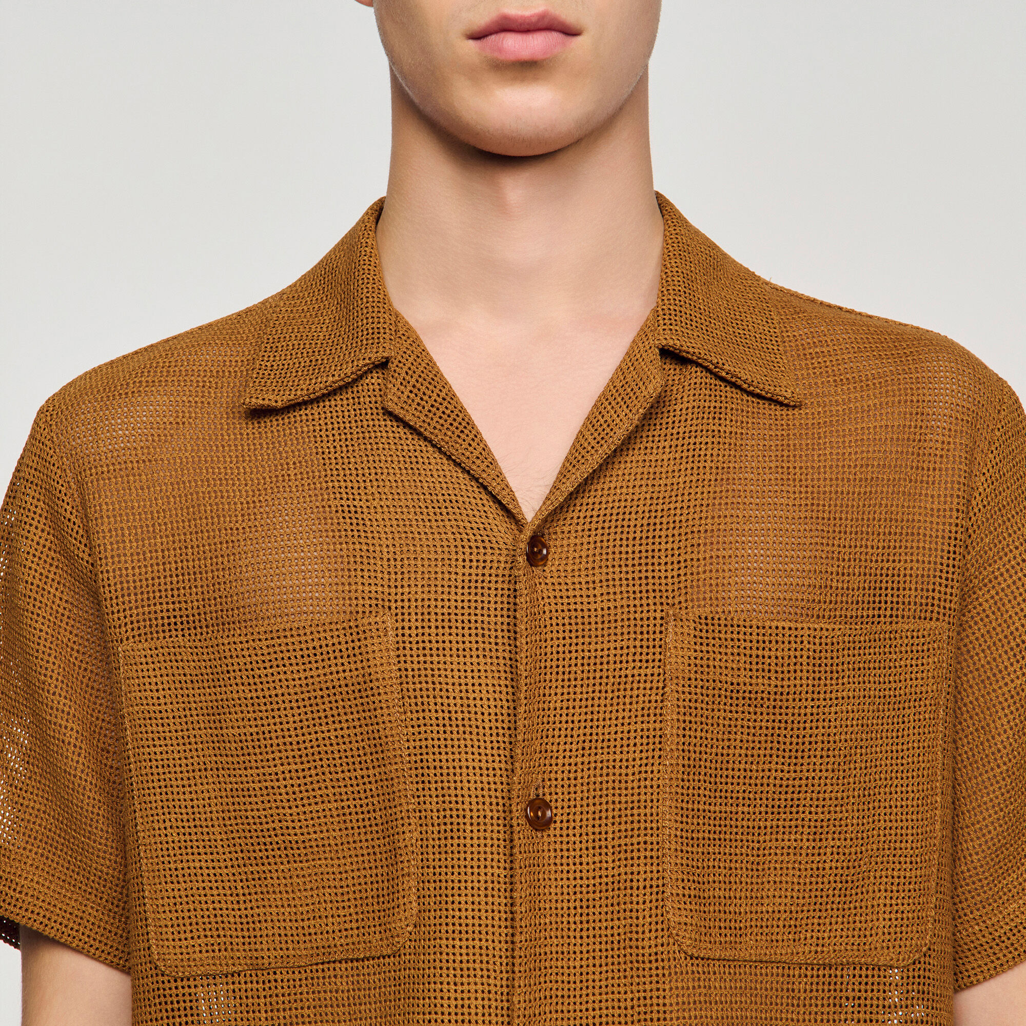 Chemise en maille ajourée