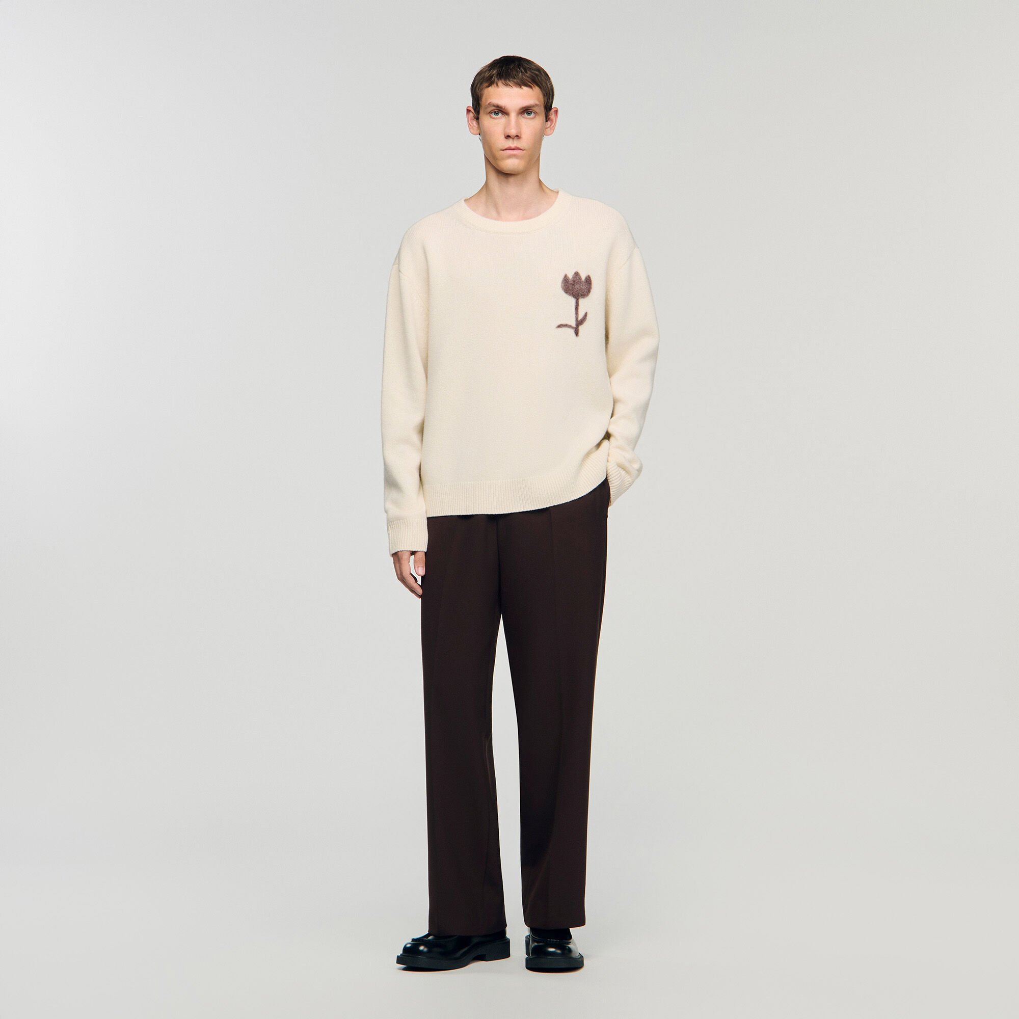 Pull en laine avec détails floraux