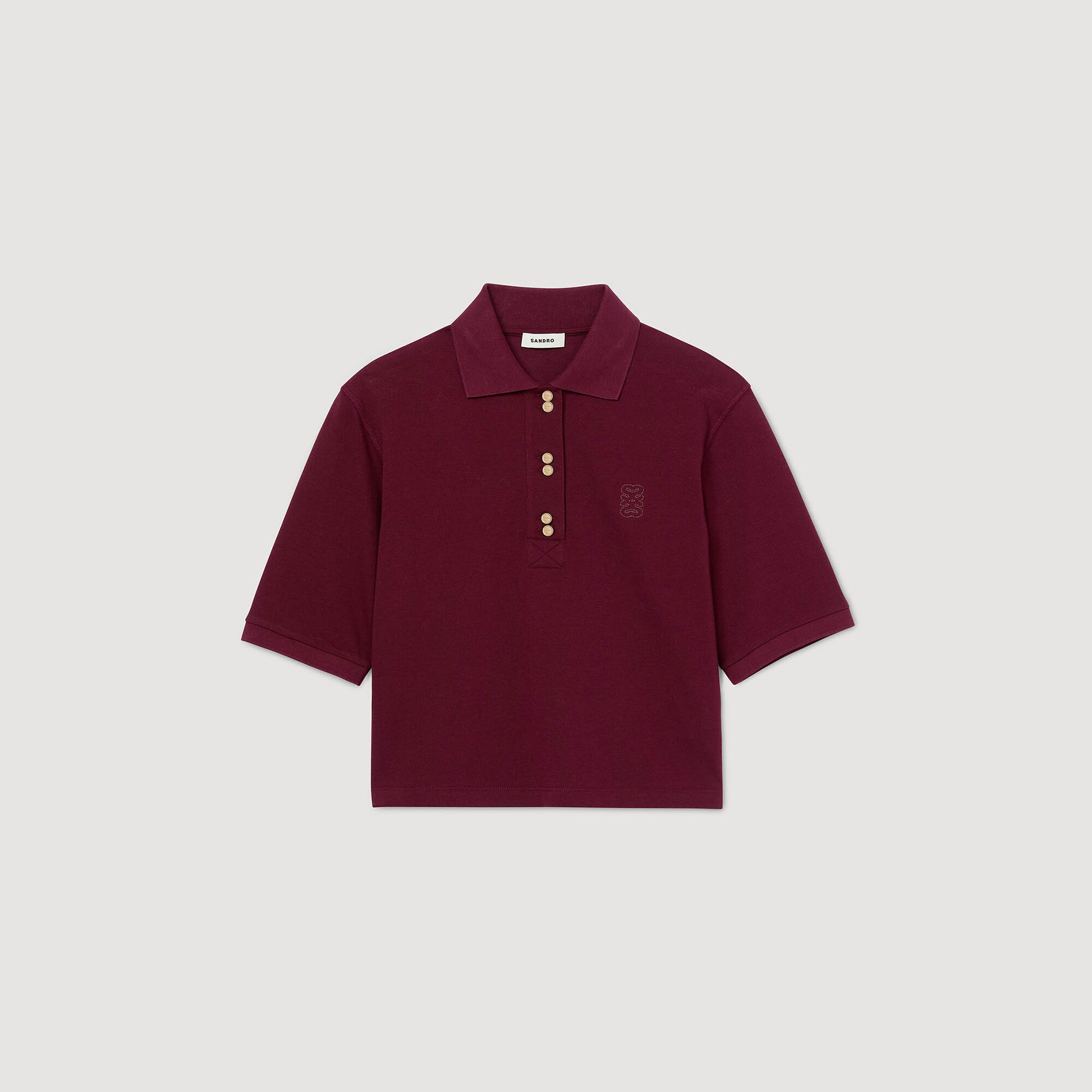 Chemise polo à boutons décoratifs