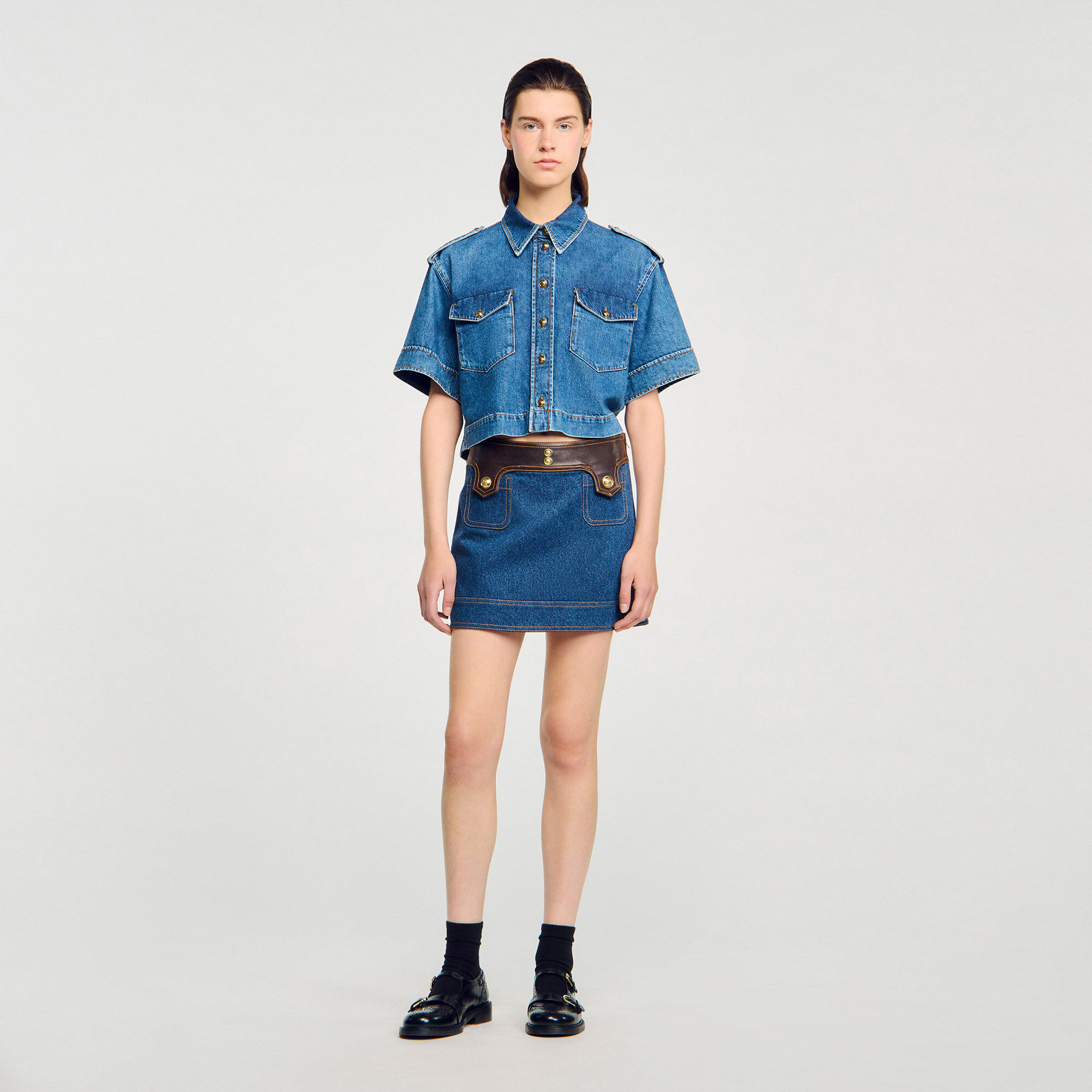 Mini jupe en denim et cuir
